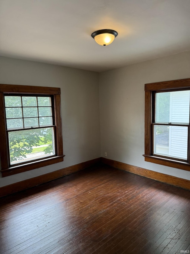 310 W Leith St, Fort Wayne, IN 46807 - spare room with healthy amount of natural light and dark wood-style floors
