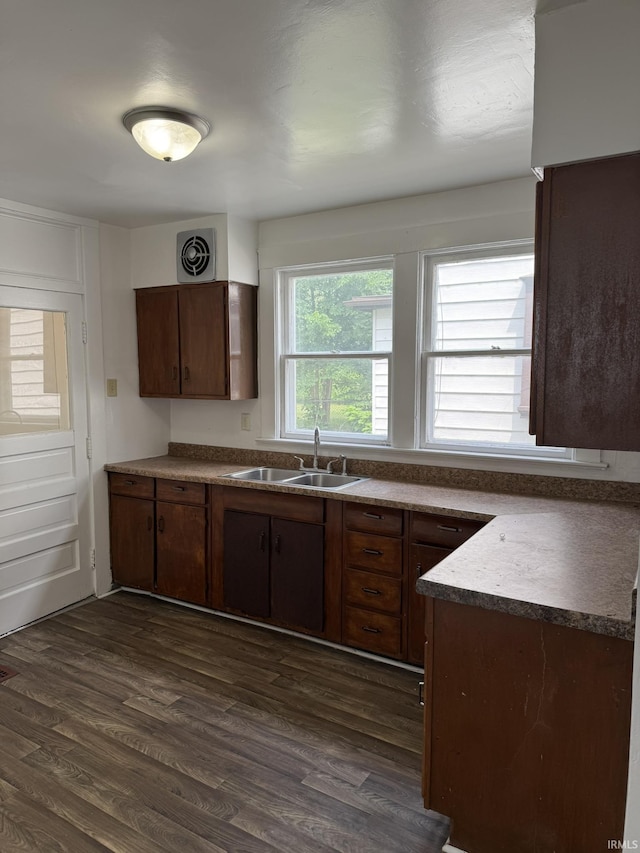 310 W Leith St, Fort Wayne, IN 46807 - kitchen featuring a sink and dark wood-style flooring