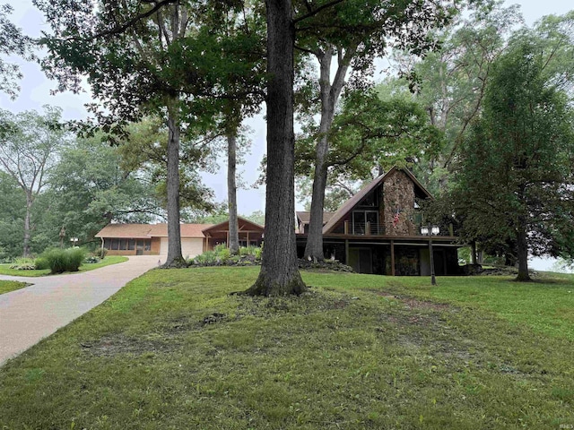 299 Spring Haven Rd, Mitchell, IN 47446 - view of front of house with a front lawn and concrete driveway