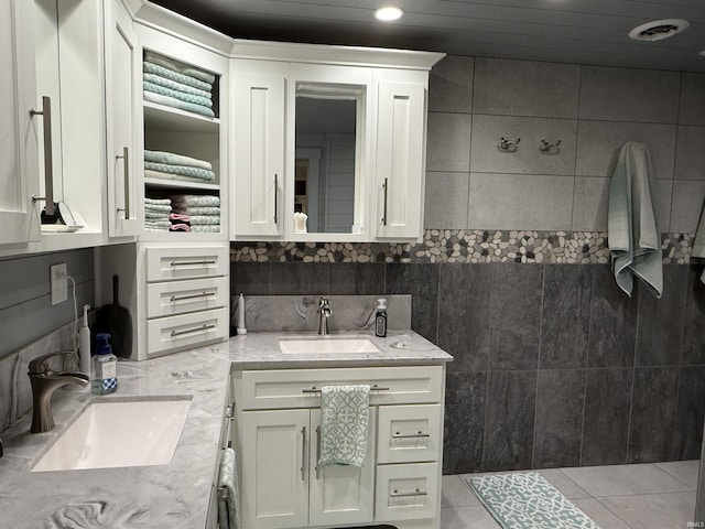 299 Spring Haven Rd, Mitchell, IN 47446 - full bath with vanity, a tile shower, recessed lighting, tile patterned flooring, and tile walls