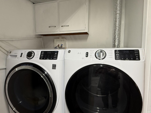 299 Spring Haven Rd, Mitchell, IN 47446 - laundry room with independent washer and dryer and cabinet space