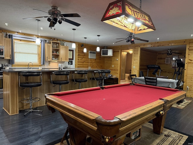 299 Spring Haven Rd, Mitchell, IN 47446 - rec room with ceiling fan, dark wood finished floors, wood walls, pool table, and wet bar