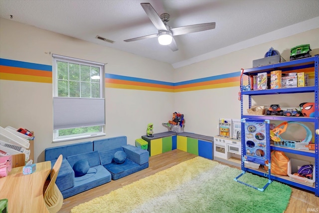 1045 E Chris Ln, Bloomington, IN 47401 - rec room featuring wood finished floors and ceiling fan