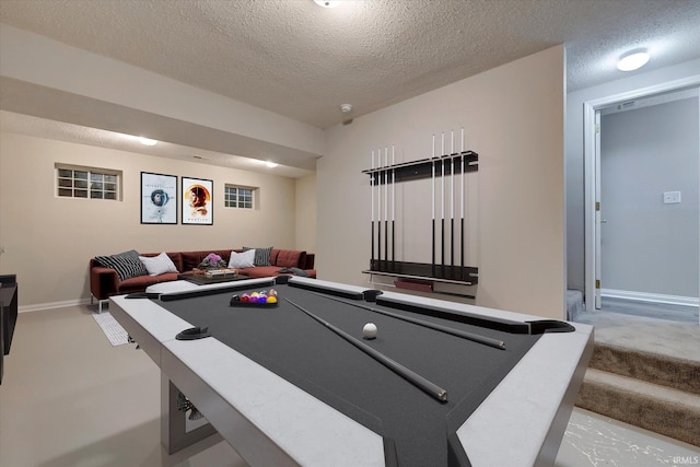 1045 E Chris Ln, Bloomington, IN 47401 - game room with a textured ceiling and baseboards