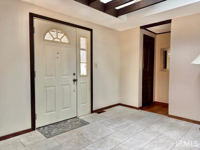 54213 Terrace Ln, South Bend, IN 46635 - foyer featuring light tile patterned floors