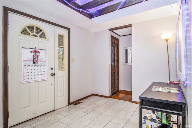 54213 Terrace Ln, South Bend, IN 46635 - foyer entrance with baseboards and light tile patterned floors
