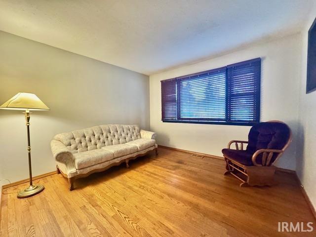 54213 Terrace Ln, South Bend, IN 46635 - sitting room featuring wood finished floors and baseboards
