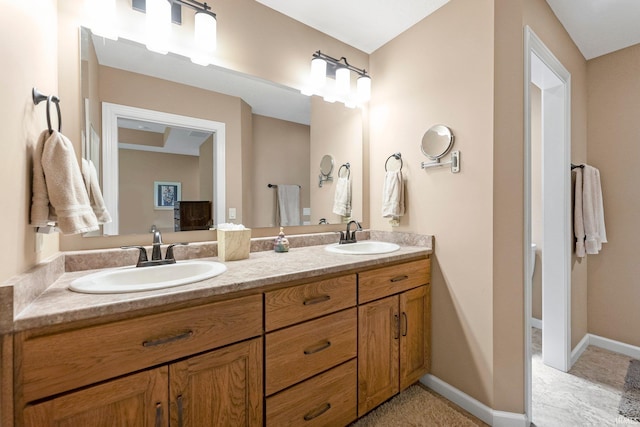 10057 Chapmans Cv, Fort Wayne, IN 46835 - full bathroom with double vanity and baseboards