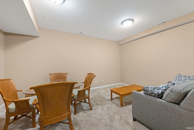10057 Chapmans Cv, Fort Wayne, IN 46835 - dining area featuring light colored carpet and a textured ceiling