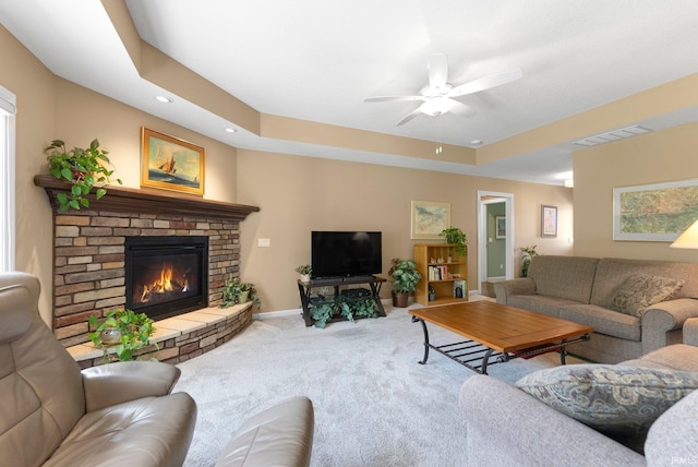 10057 Chapmans Cv, Fort Wayne, IN 46835 - carpeted living area featuring a ceiling fan, a fireplace, and recessed lighting
