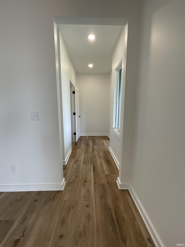 1609 Diane Dr, Ossian, IN 46777 - hall with wood finished floors and recessed lighting