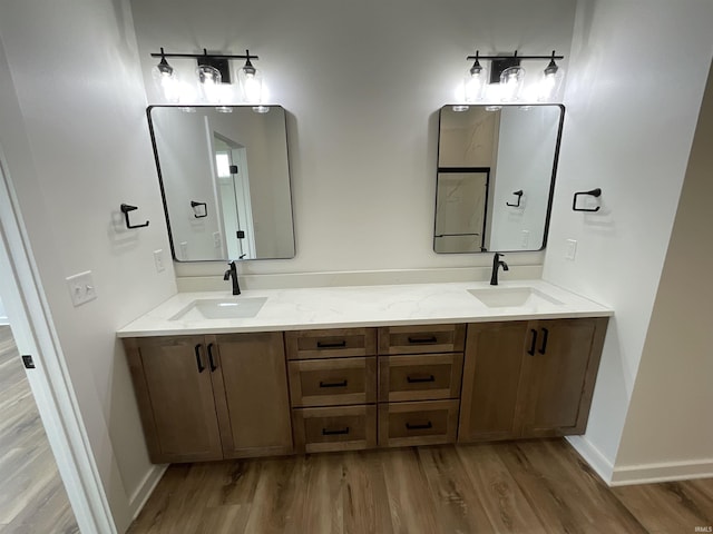 1609 Diane Dr, Ossian, IN 46777 - bathroom with wood finished floors and double vanity