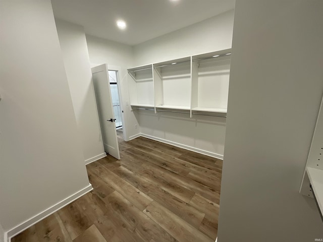 1609 Diane Dr, Ossian, IN 46777 - walk in closet with dark wood-type flooring