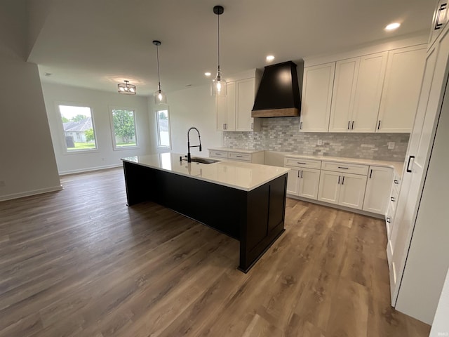 1609 Diane Dr, Ossian, IN 46777 - kitchen with custom exhaust hood, tasteful backsplash, wood finished floors, and recessed lighting