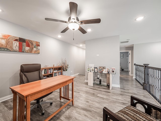 8675 Pebble Creek Dr, Newburgh, IN 47630 - office featuring a ceiling fan, recessed lighting, and wood finished floors