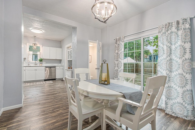 914 Golden Ave, South Bend, IN 46616 - dining room with a chandelier and dark wood finished floors