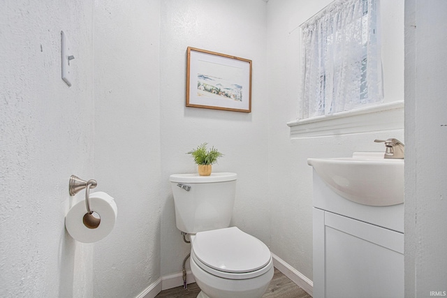 914 Golden Ave, South Bend, IN 46616 - bathroom with vanity and wood finished floors