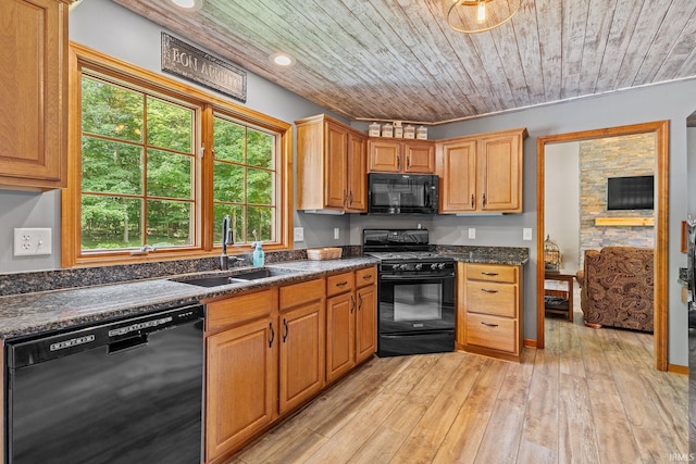 32750 Deer Watch Ct, New Carlisle, IN 46552 - kitchen with black appliances, wood ceiling, dark countertops, plenty of natural light, and light wood-type flooring