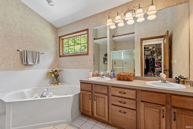 32750 Deer Watch Ct, New Carlisle, IN 46552 - full bath with a stall shower, tile patterned flooring, a jetted tub, double vanity, and a walk in closet