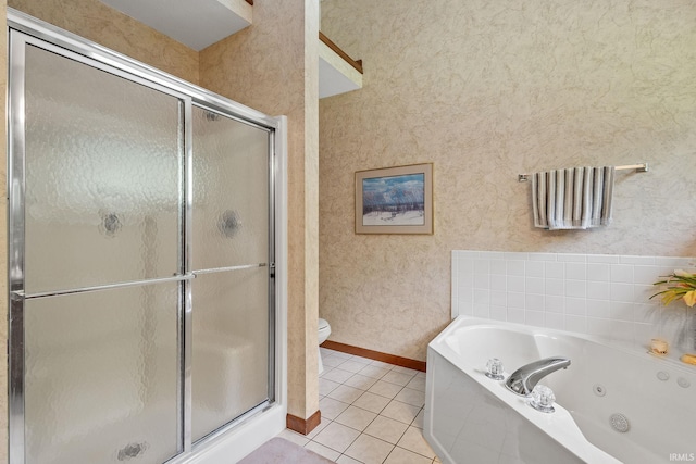 32750 Deer Watch Ct, New Carlisle, IN 46552 - bathroom with a shower stall, a jetted tub, tile patterned floors, and wallpapered walls