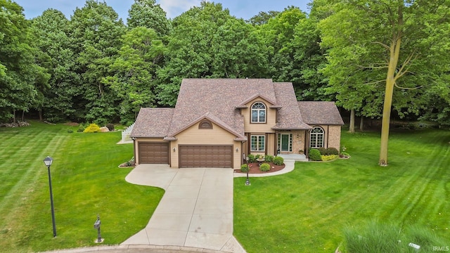 32750 Deer Watch Ct, New Carlisle, IN 46552 - traditional-style home with a front lawn, an attached garage, concrete driveway, and roof with shingles