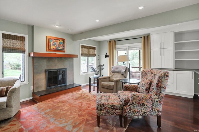 2910 E Winston St, Bloomington, IN 47401 - living area with a high end fireplace, dark wood-style flooring, and recessed lighting