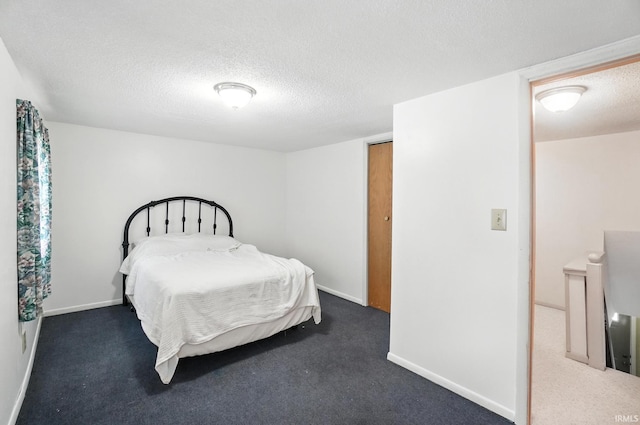 2707 Stanford Ave, Fort Wayne, IN 46808 - bedroom featuring a textured ceiling and carpet floors