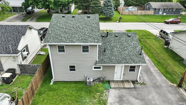 2707 Stanford Ave, Fort Wayne, IN 46808 - rear view of property with a shingled roof, a fenced backyard, and a wooden deck