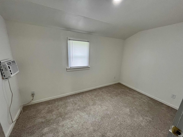 410 N Jay St, Kokomo, IN 46947 - carpeted empty room with an AC wall unit and baseboards