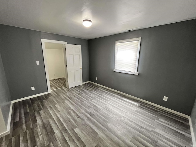 410 N Jay St, Kokomo, IN 46947 - unfurnished bedroom with wood finished floors