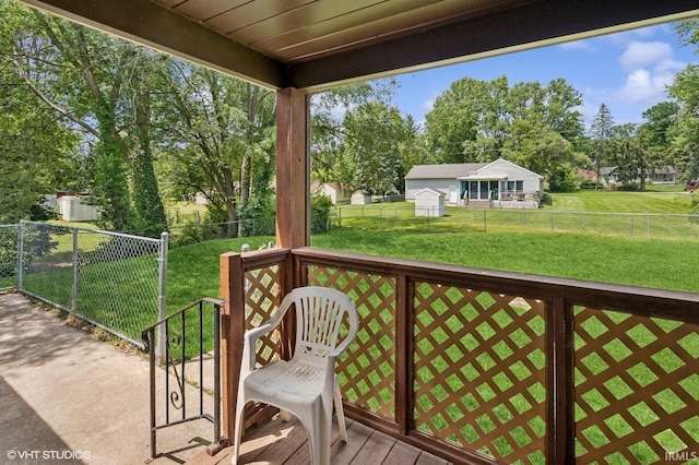19629 Gilmer St, South Bend, IN 46614 - wooden deck featuring view of scattered trees and a fenced backyard