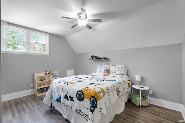 718 N Cedar St, Auburn, IN 46706 - bedroom with wood finished floors, vaulted ceiling, and a ceiling fan