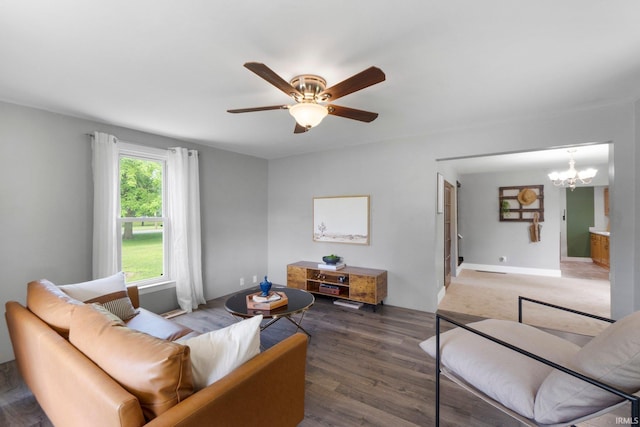 718 N Cedar St, Auburn, IN 46706 - living area with a chandelier, ceiling fan, and wood finished floors