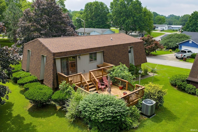 600 Forest Dr, Bloomfield, IN 47424 - back of house featuring roof with shingles, a wooden deck, stairs, and a yard