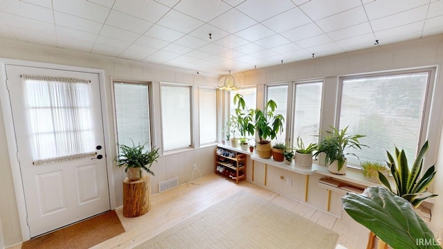 325 W 5th St, Jasper, IN 47546 - doorway to outside featuring wood finished floors