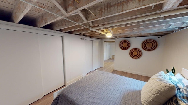325 W 5th St, Jasper, IN 47546 - bedroom featuring baseboards and light wood-type flooring