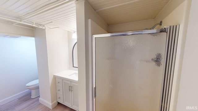 325 W 5th St, Jasper, IN 47546 - full bathroom featuring wood finished floors, a stall shower, and vanity