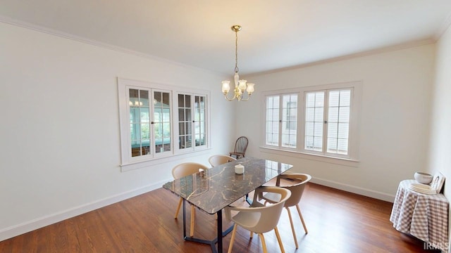 325 W 5th St, Jasper, IN 47546 - dining room featuring a chandelier, dark wood finished floors, and ornamental molding