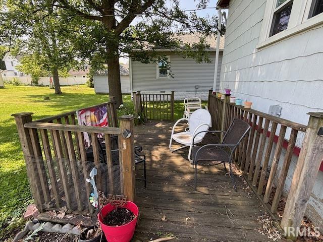 307 N Madison Ave, Fowler, IN 47944 - deck featuring a lawn