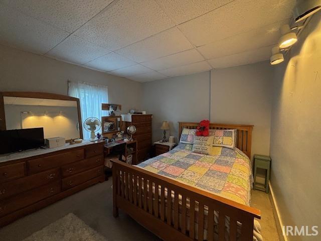 307 N Madison Ave, Fowler, IN 47944 - carpeted bedroom featuring a paneled ceiling