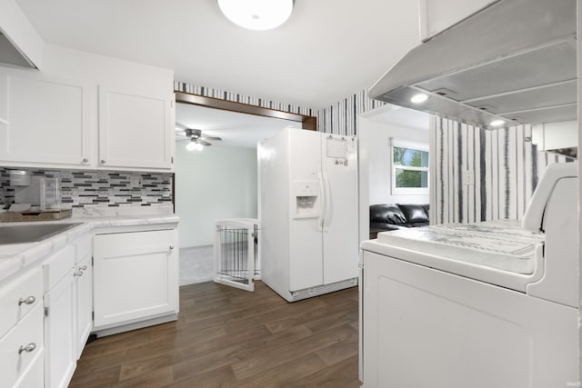 2606 Prairie Grove Dr, Fort Wayne, IN 46809 - washroom featuring washer / clothes dryer, dark wood-type flooring, and ceiling fan