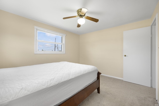 2606 Prairie Grove Dr, Fort Wayne, IN 46809 - bedroom featuring light carpet and a ceiling fan