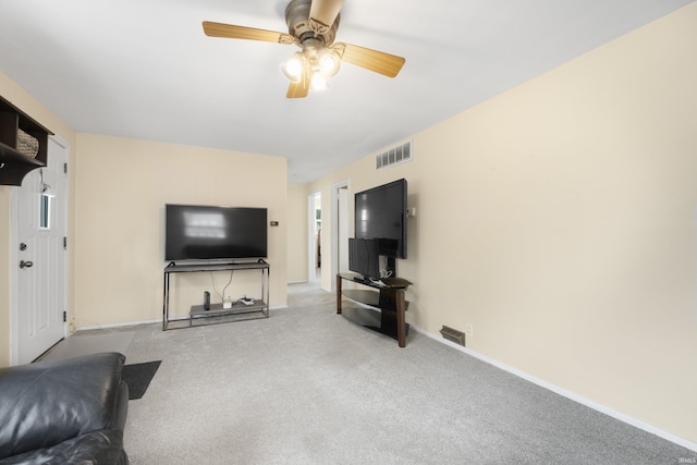 2606 Prairie Grove Dr, Fort Wayne, IN 46809 - living area with carpet flooring and a ceiling fan