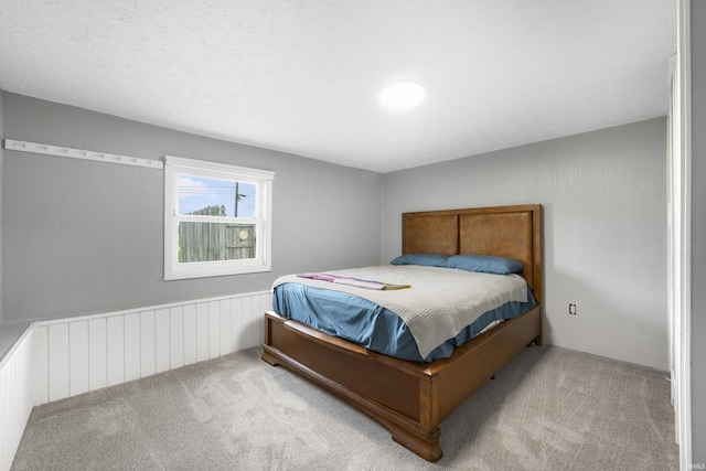 2606 Prairie Grove Dr, Fort Wayne, IN 46809 - bedroom with carpet floors and a wainscoted wall