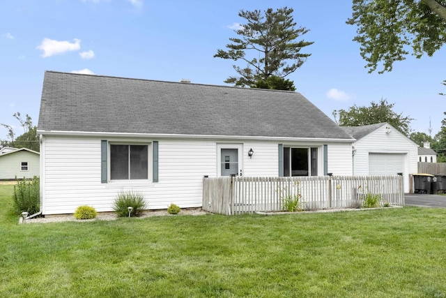 2606 Prairie Grove Dr, Fort Wayne, IN 46809 - cape cod house with roof with shingles, an attached garage, and driveway