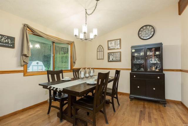12069 N Timberline Trce, Granger, IN 46530 - dining area with a chandelier and wood finished floors