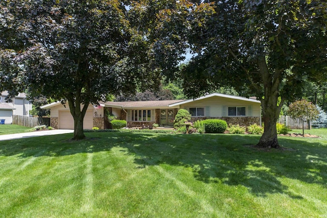 12069 N Timberline Trce, Granger, IN 46530 - single story home featuring stone siding, an attached garage, and concrete driveway