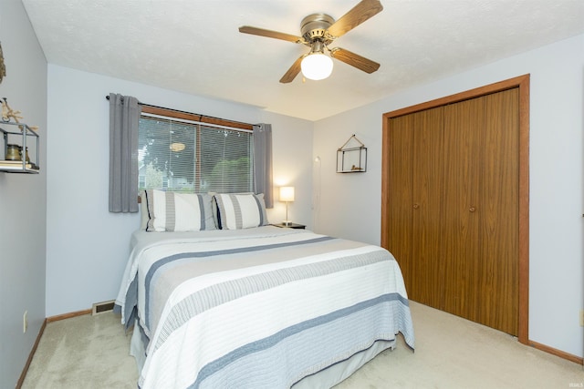 12069 N Timberline Trce, Granger, IN 46530 - bedroom featuring carpet, a closet, and a ceiling fan