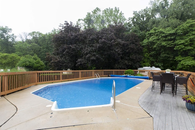 12069 N Timberline Trce, Granger, IN 46530 - view of swimming pool with a wooden deck