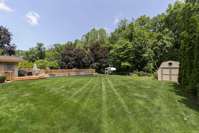 12069 N Timberline Trce, Granger, IN 46530 - view of yard featuring a storage shed and a deck